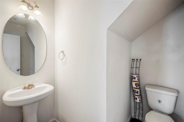 bathroom featuring toilet