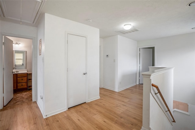 hall featuring light hardwood / wood-style floors