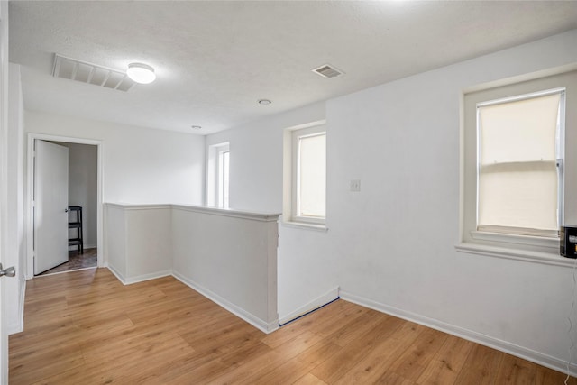 empty room featuring light hardwood / wood-style flooring