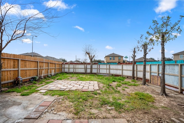 view of yard with a patio area