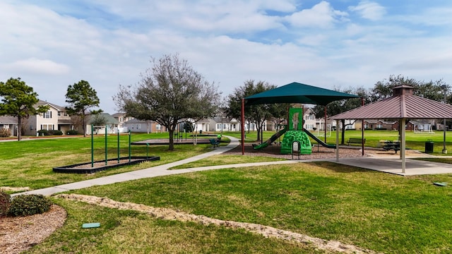 view of play area featuring a lawn