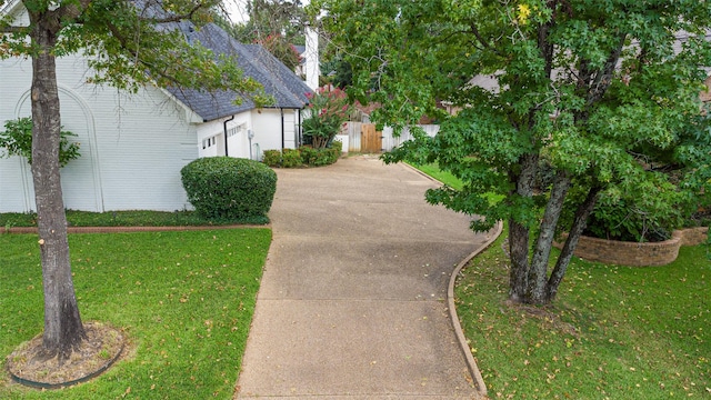 view of home's exterior featuring a lawn