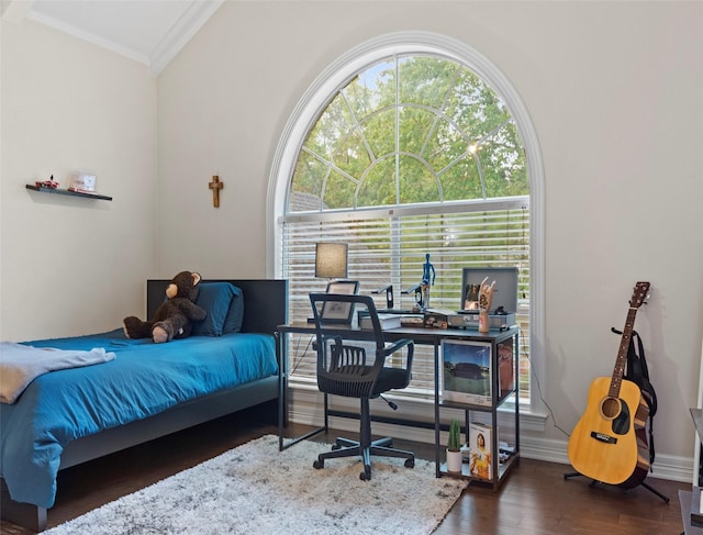 bedroom featuring ornamental molding and dark hardwood / wood-style floors