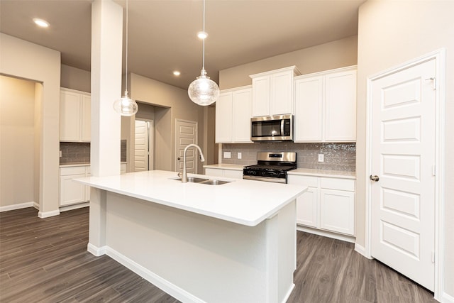 kitchen featuring white cabinetry, appliances with stainless steel finishes, and sink