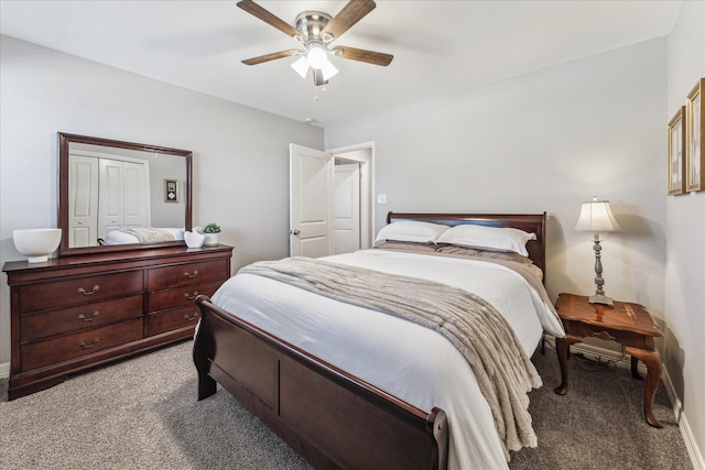 bedroom with ceiling fan and light colored carpet