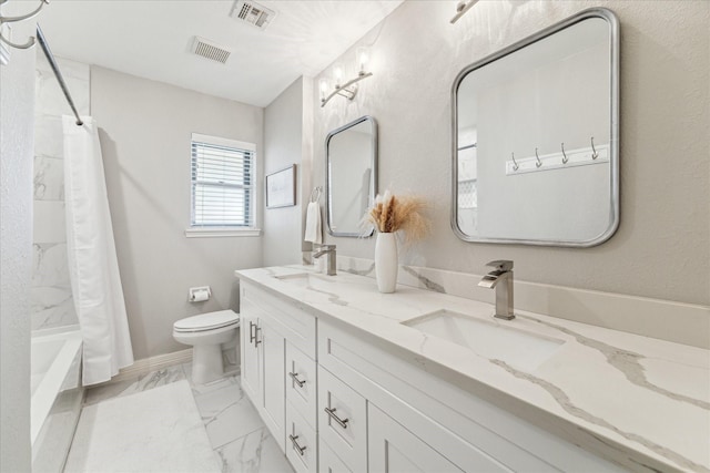 full bathroom with vanity, shower / bath combo, and toilet