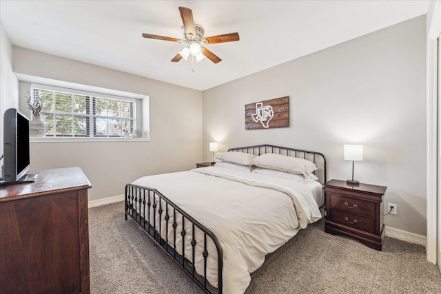 bedroom with ceiling fan and carpet flooring