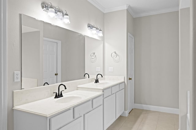 bathroom featuring ornamental molding, tile patterned flooring, and vanity