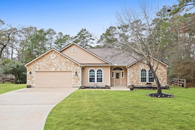 ranch-style house featuring a garage and a front lawn