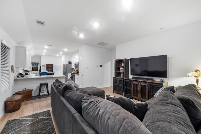 living room featuring light hardwood / wood-style flooring