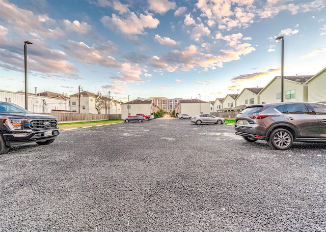 650 Westcross St Unit 19, Houston, TX 77018 - view of parking / parking lot featuring a residential view and fence