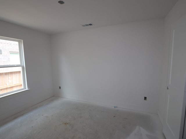 21666 Sandy Dune Dr, Cypress, TX 77433 - empty room with concrete floors and baseboards