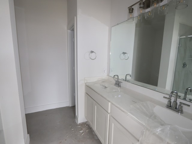 21666 Sandy Dune Dr, Cypress, TX 77433 - full bathroom with concrete flooring, double vanity, and a shower stall