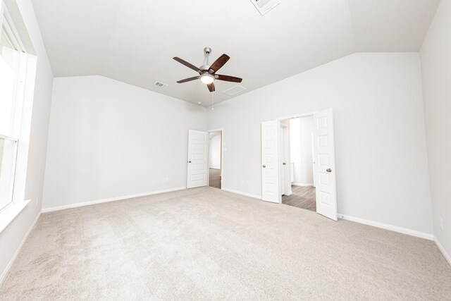 3013 Plains Cir, Brookshire, TX 77423 - unfurnished bedroom with vaulted ceiling, carpet, and visible vents