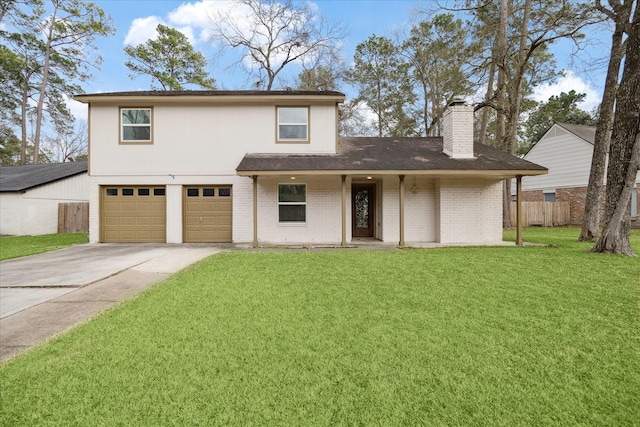 front of property featuring a garage and a front yard