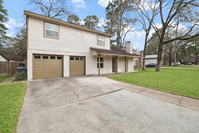 front facade with a garage, central AC unit, and a front lawn