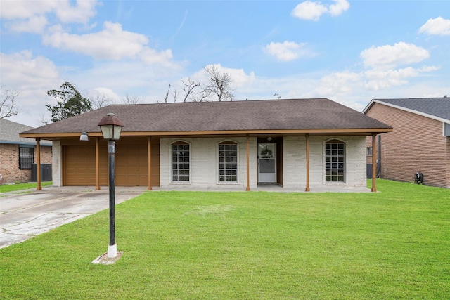 ranch-style house with central AC unit and a front yard