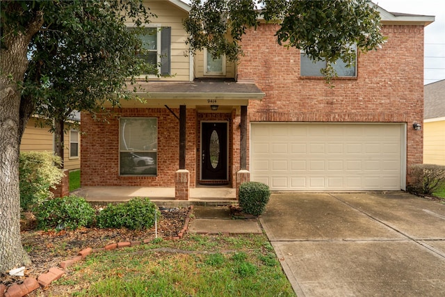 view of front of home featuring a garage and a porch