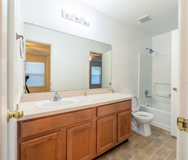 full bathroom with vanity, shower / bathtub combination, and toilet