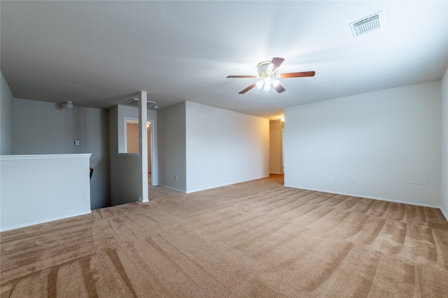 carpeted empty room with ceiling fan