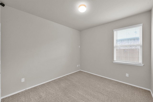 empty room with carpet floors