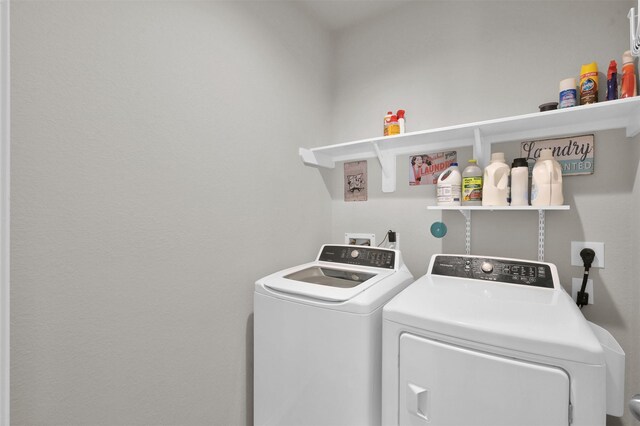 laundry area with washer and clothes dryer