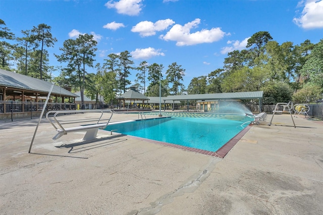 view of pool featuring a patio and a gazebo