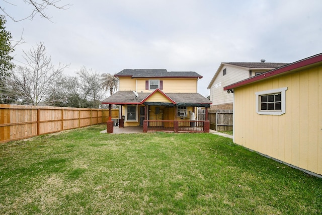 back of property featuring cooling unit, a lawn, and a patio area