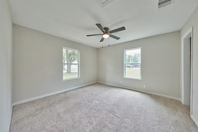 carpeted empty room with ceiling fan