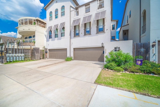 view of front of property featuring a garage