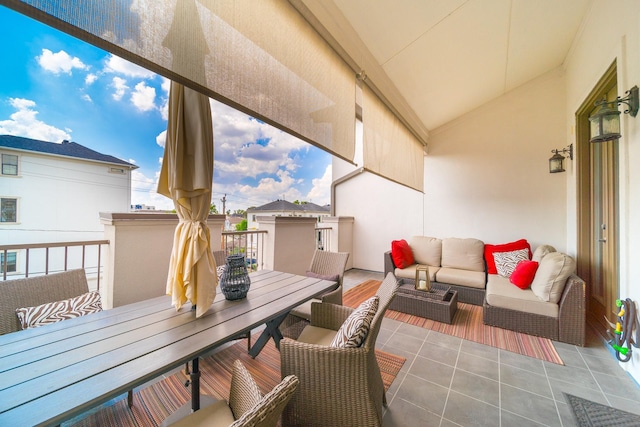 exterior space with an outdoor hangout area and a patio