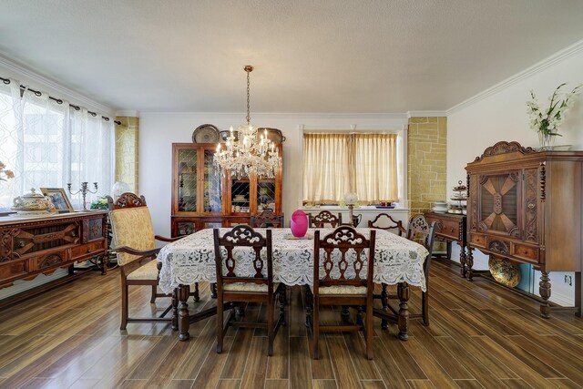 49 Briar Hollow Ln Unit 302, Houston, TX 77027 - dining area featuring crown molding, a notable chandelier, and wood finished floors