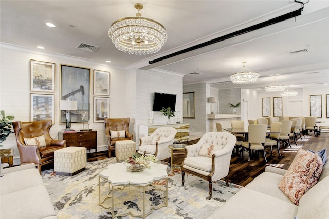 49 Briar Hollow Ln Unit 302, Houston, TX 77027 - living room featuring wood finished floors, ornamental molding, and a notable chandelier