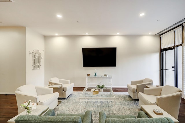 49 Briar Hollow Ln Unit 302, Houston, TX 77027 - living room featuring recessed lighting, wood finished floors, and baseboards