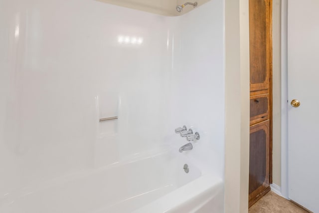 bathroom featuring  shower combination