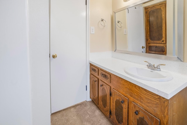 bathroom with vanity and tile patterned floors