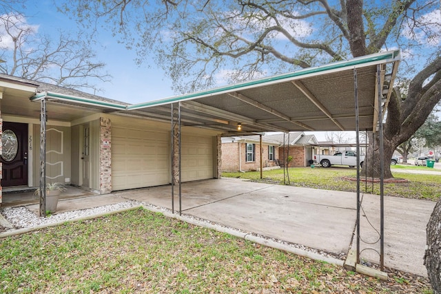 view of parking featuring a carport, a yard, and a garage