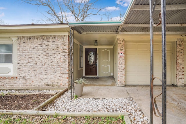 property entrance featuring a garage