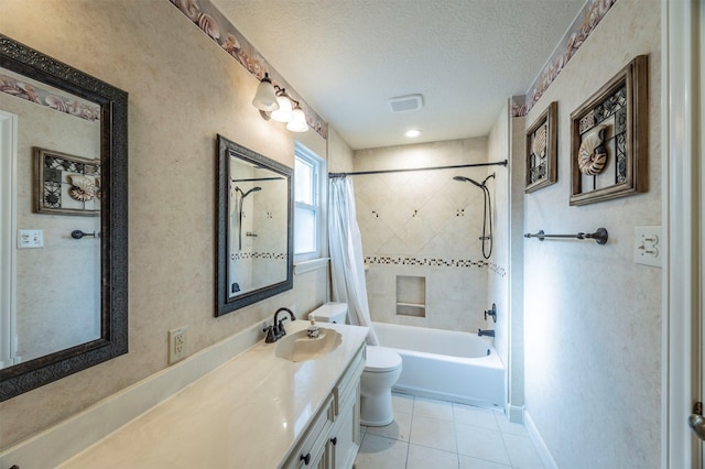 bathroom with toilet, shower / tub combo, a textured ceiling, vanity, and tile patterned flooring