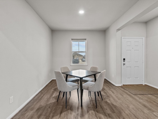 dining room with hardwood / wood-style floors