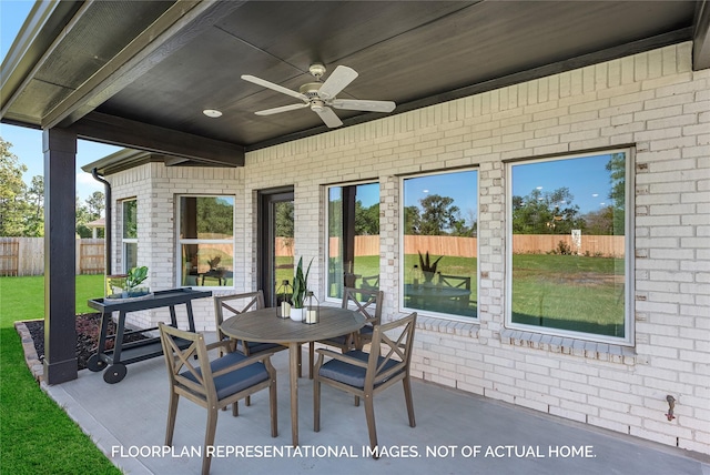 view of patio featuring ceiling fan