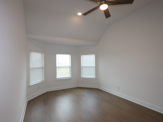 134 Spring Rose Dr, Magnolia, TX 77354 - empty room with ceiling fan, dark wood finished floors, and vaulted ceiling