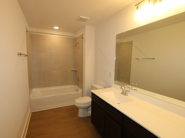 134 Spring Rose Dr, Magnolia, TX 77354 - bathroom with vanity, wood finished floors, shower / bath combination, and recessed lighting