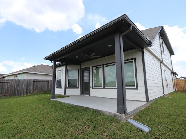 134 Spring Rose Dr, Magnolia, TX 77354 - back of house featuring a patio, a fenced backyard, and ceiling fan