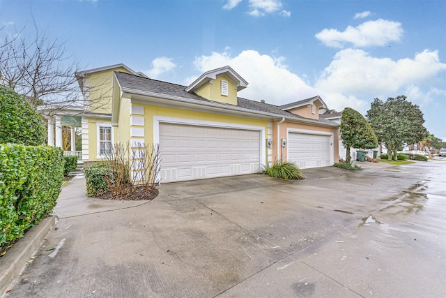 view of property exterior featuring a garage