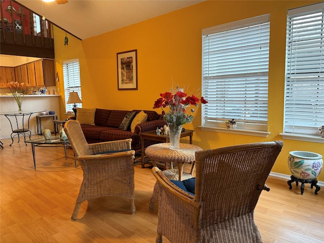 living room featuring plenty of natural light and light wood-type flooring