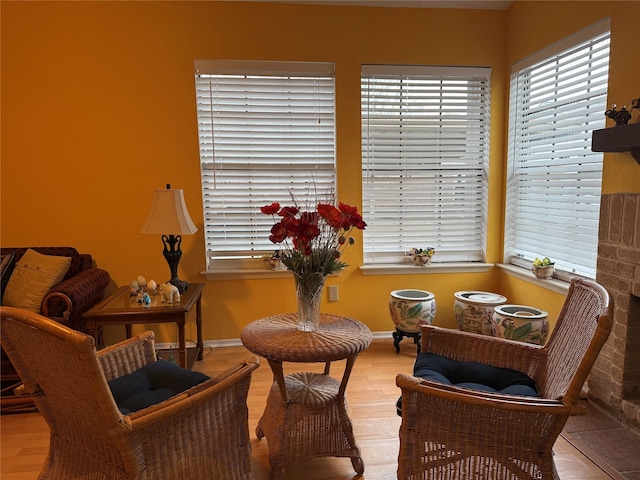 sitting room with light hardwood / wood-style floors