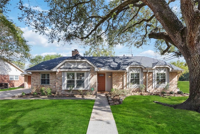 view of front of home with a front lawn