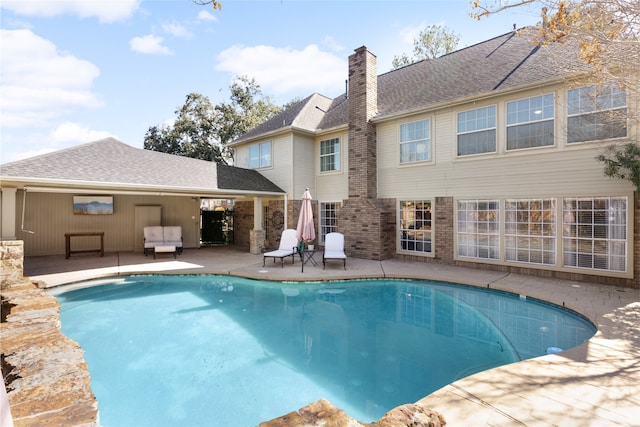 view of pool with a patio area