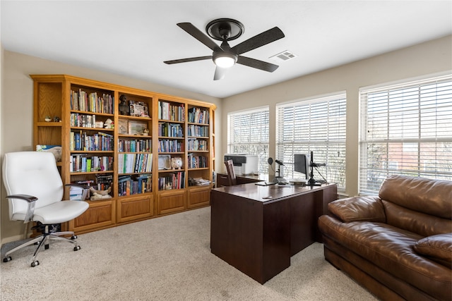 office area with carpet flooring and ceiling fan